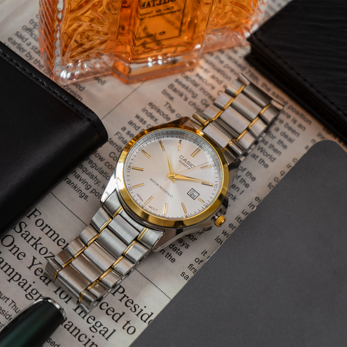 ساعت عقربه ای نقره ای طلایی صفحه سفید Casio مدل Edmon